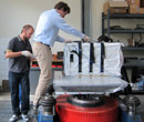 DTM personnel at P&P managing<br>the vib-test of EML GAS module inside M01 bag